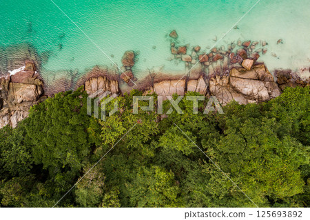 Top view waves crashing on rocks seascape background,Wide angle sea nature background 125693892