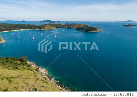 Aerial view of a blue sea surface water texture background and sun reflections Aerial flying drone view Waves water surface texture on sunny tropical ocean in Phuket island Thailand Aerial view of a blue sea surface water texture background and sun reflections Aerial flying drone view Waves water surface texture on sunny tropical ocean in Phuket island Thailand 125693918