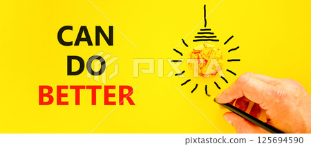Can do better symbol. Concept words Can do better on beautiful yellow paper. Beautiful yellow background. Businessman hand with pen. Business and can do better concept. Copy space. Can do better symbol. Concept words Can do better on beautiful yellow paper. Beautiful yellow background. Businessman hand with pen. Business and can do better concept. Copy space. 125694590