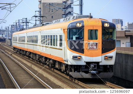 Kintetsu 30000 series express train running on the elevated section of the Kintetsu Nagoya Line Kintetsu 30000 series express train running on the elevated section of the Kintetsu Nagoya Line 125696097