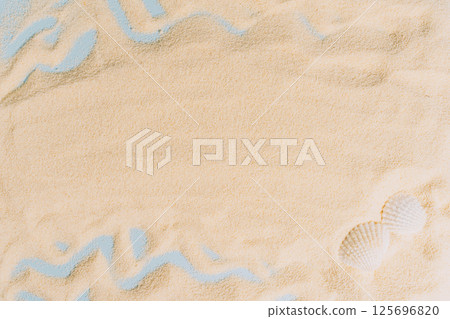 summer background of beach golden sand with with blue waves summer background of beach golden sand with with blue waves 125696820