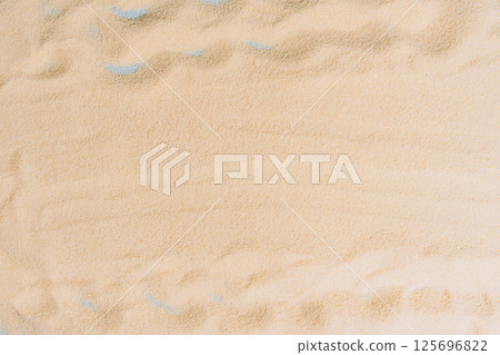 summer background of beach golden sand with with blue waves summer background of beach golden sand with with blue waves 125696822