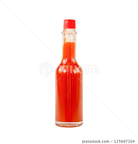 A bottle of Tabasco pepper sauce isolated A bottle of Tabasco pepper sauce isolated 125697104
