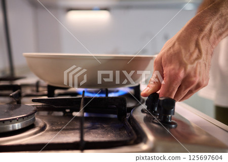 Preparing meals on the stove using a pot can be a delightful culinary experience 125697604