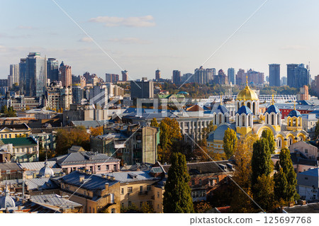 Elevated view of the Kyiv cityscape, prominently featuring the historic St Volodymyr's Cathedral 125697768