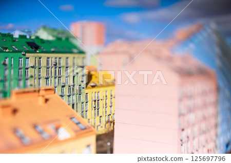 Vibrant tilt-shift image showcasing the colorful modern residential architecture of Comfort Town Vibrant tilt-shift image showcasing the colorful modern residential architecture of Comfort Town 125697796