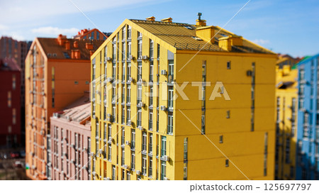 Vibrant tilt-shift image showcasing the colorful modern residential architecture of Comfort Town 125697797