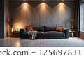 Modern Minimalist Living Room with Cozy Lighting and Dark Sofa 125697831
