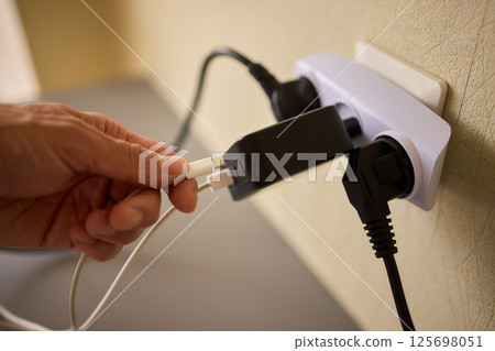 Connecting an Electric Device in Your Home Environment for Daily Use and Convenience 125698051