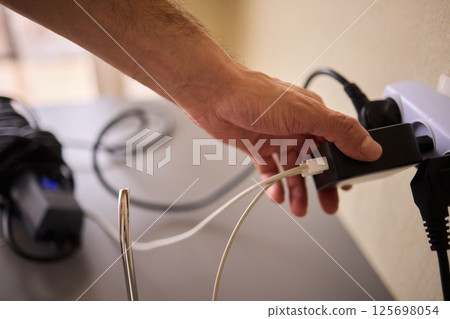 Connecting an Electric Device in Your Home Environment for Daily Use and Convenience Connecting an Electric Device in Your Home Environment for Daily Use and Convenience 125698054