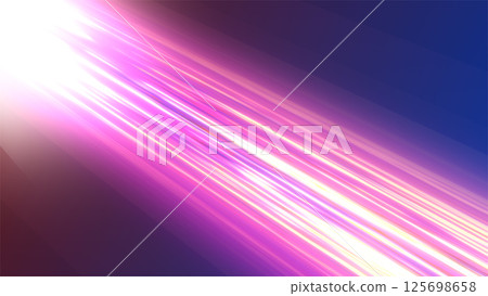 A futuristic pink and purple light trail moving at high speed across a dark background A futuristic pink and purple light trail moving at high speed across a dark background 125698658