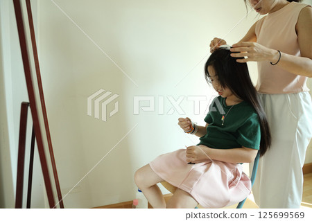 East Asian Girl with Mom 125699569