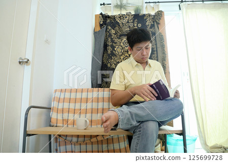 East Asian Man 125699728