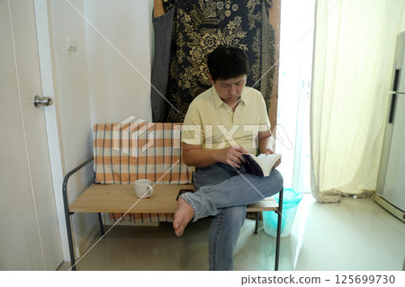 East Asian Man 125699730