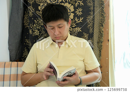 East Asian Man East Asian Man 125699738