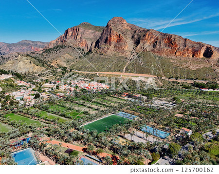 Aerial view of Orihuela townscape during sunny day. Spain Aerial view of Orihuela townscape during sunny day. Spain 125700162