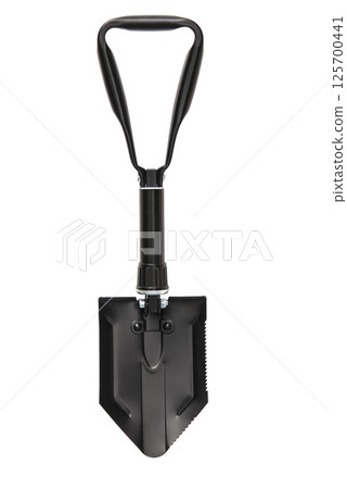 Black folding camping shovel isolated on white background. Army portable tool 125700441
