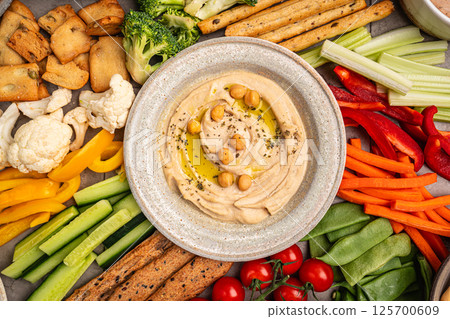 Various hummus dips, healthy and vegan snack Various hummus dips, healthy and vegan snack 125700609