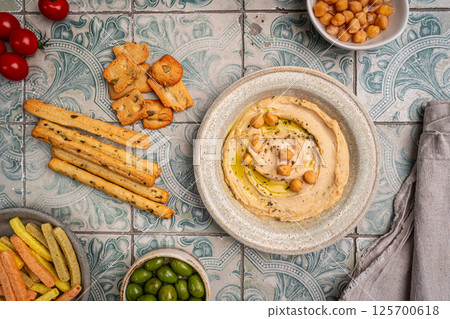 Various hummus dips, healthy and vegan snack Various hummus dips, healthy and vegan snack 125700618