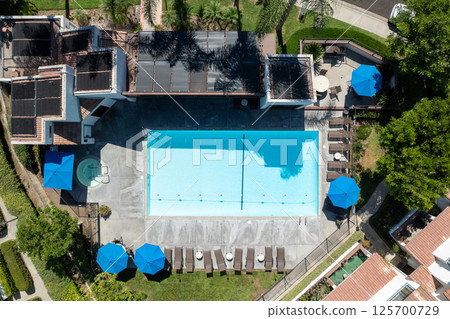 Aerial view of residential subdivision house neighborhood with pool in Mission Mesa. South California, USA Aerial view of residential subdivision house neighborhood with pool in Mission Mesa. South California, USA 125700729