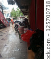 a car parked on the street 125700738