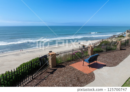 Bench view at the beach and ocean Bench view at the beach and ocean 125700747