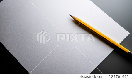 Blank Sheet of Paper with a Yellow Wooden Pencil on Dark Surface 125701661