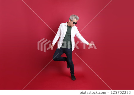 Active East Asian Man 125702253