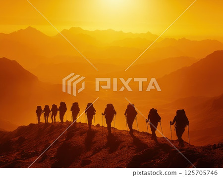 Hikers on Mountain Ridge at Sunrise (1) 125705746