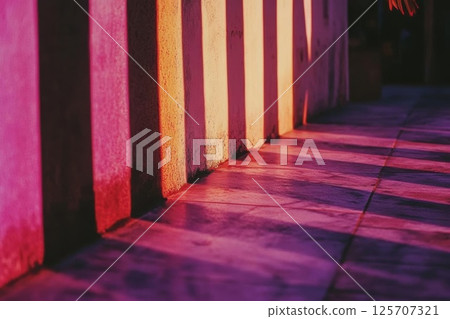 Pink Wall Casts Long Shadows on Tile Floor, Golden Hour Sunlight Architecture Design. 125707321