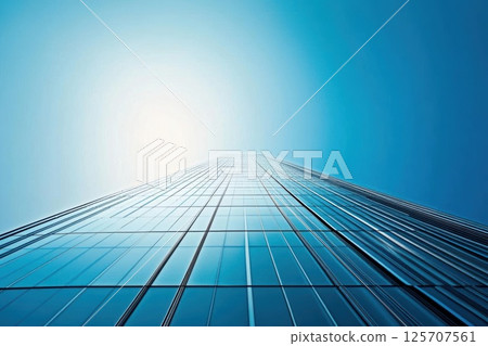 Skyscraper Reaches for the Sky on a Sunny Day with Modern Architecture and Urban Design Themes 125707561