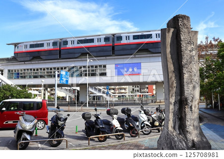 Transportation plaza and stone monument at Yui Rail Akamine Station, the southernmost station in Japan 125708981