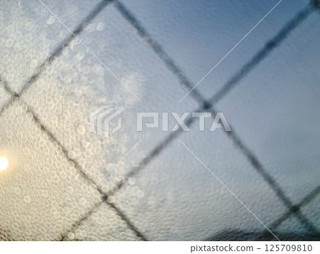 Stock Photo: Image of water droplets on a window 125709810
