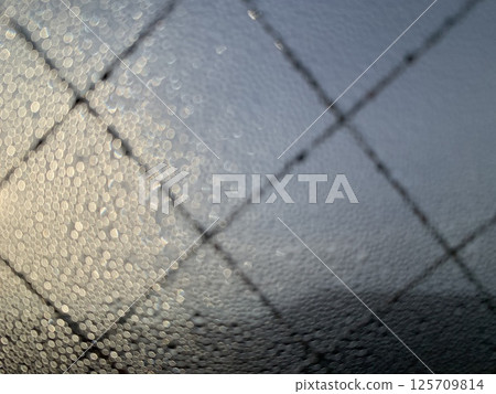 Stock Photo: Image of water droplets on a window Stock Photo: Image of water droplets on a window 125709814