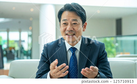 A team of business people working in an office A team of business people working in an office 125710913