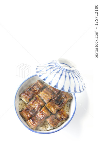 Hot eel bowl photographed on white background Hot eel bowl photographed on white background 125712180