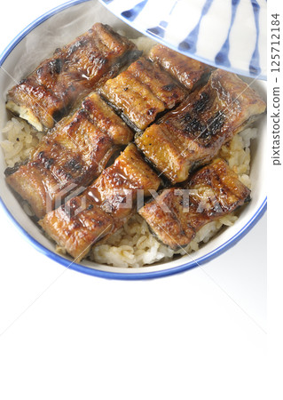 Hot eel bowl photographed on white background 125712184