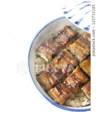 Hot eel bowl photographed on white background Hot eel bowl photographed on white background 125712185