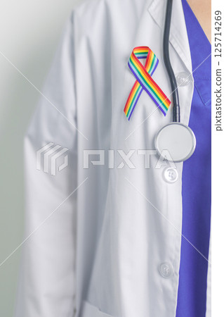 Doctor with LGBTQ Rainbow ribbon for Support Lesbian, Gay, Bisexual, Transgender and Queer community and happy Pride month concept 125714269