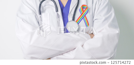 Doctor with LGBTQ Rainbow ribbon for Support Lesbian, Gay, Bisexual, Transgender and Queer community and happy Pride month concept Doctor with LGBTQ Rainbow ribbon for Support Lesbian, Gay, Bisexual, Transgender and Queer community and happy Pride month concept 125714272