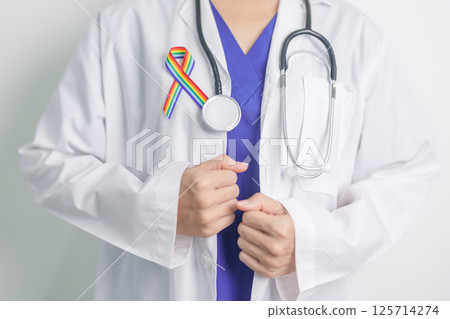 Doctor with LGBTQ Rainbow ribbon for Support Lesbian, Gay, Bisexual, Transgender and Queer community and happy Pride month concept Doctor with LGBTQ Rainbow ribbon for Support Lesbian, Gay, Bisexual, Transgender and Queer community and happy Pride month concept 125714274