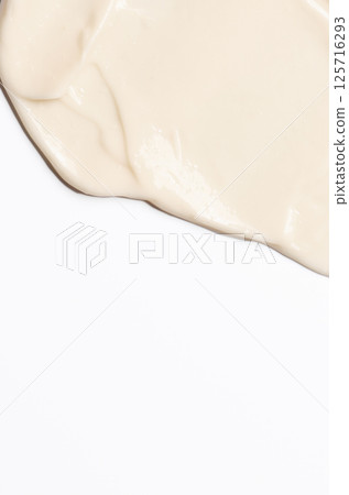 The texture of a cosmetic cream for the body or face The texture of a cosmetic cream for the body or face 125716293
