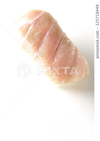 Fatty tuna nigiri photographed on white background Fatty tuna nigiri photographed on white background 125718449
