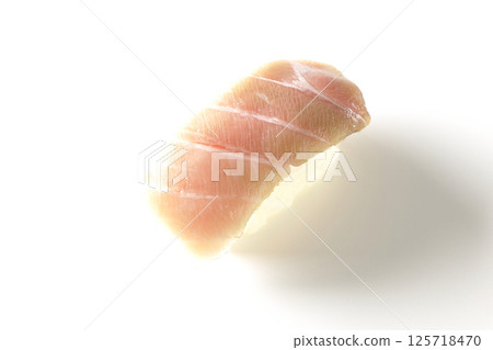Fatty tuna nigiri photographed on white background Fatty tuna nigiri photographed on white background 125718470