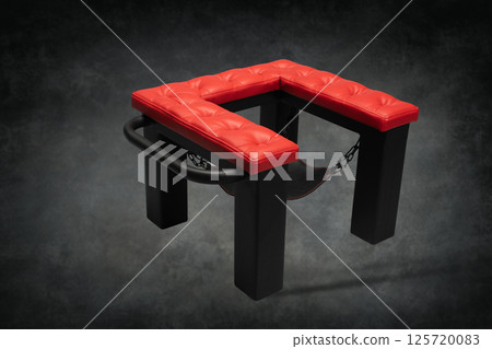 Unique bondage furniture with red padded top designed for intimate exploration and playful experiences in a private setting Unique bondage furniture with red padded top designed for intimate exploration and playful experiences in a private setting 125720083