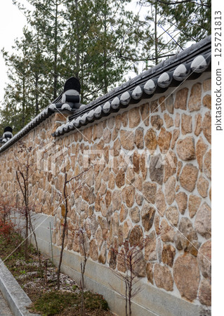 Korean traditional stone wall boundary in Eunpyeong Hanok Village, Seoul, South Korea Korean traditional stone wall boundary in Eunpyeong Hanok Village, Seoul, South Korea 125721813