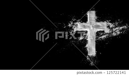 Ashes crucifix cross on black background. Religious symbol 125722141