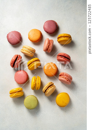 Colorful yellow, pink Macrons, top view, Sweet dessert, sugar 125722485