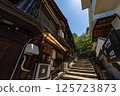Stone steps in the back alley leading to Itsukushima's Asebi Pedestrian Walkway 125723873