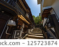 Stone steps in the back alley leading to Itsukushima's Asebi Pedestrian Walkway 125723874